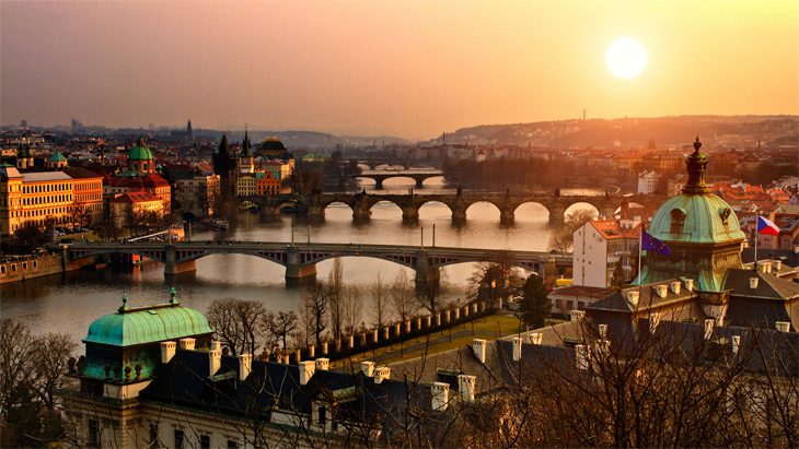 a view of Mánes Bridge at sunset in Prague Czech republic, one of the most famous bridges in prague 